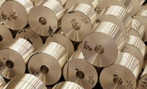 Stacked coils of aluminum sheet at the Novelis plant in Oswego, NY